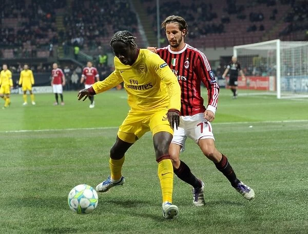 Battling for Possession: Bacary Sagna vs. Luca Antonini - AC Milan vs. Arsenal, UEFA Champions League 2012