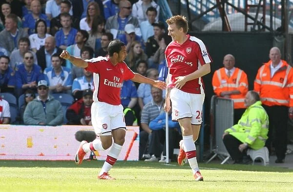 Bendtner and Walcott: Celebrating Arsenal's First Goal in a 4-0 Victory over Portsmouth