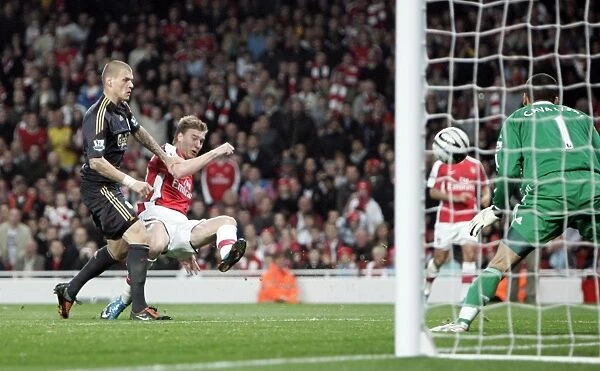 Bendtner's Brilliant Goal: Arsenal Takes 2:1 Lead Over Liverpool in Carling Cup