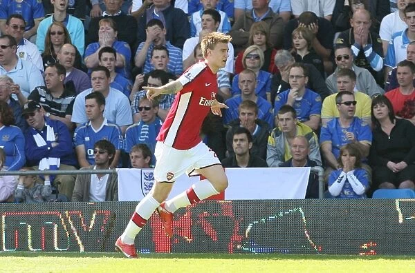 Bendtner's Debut Goal: Arsenal Crushes Portsmouth 4-0