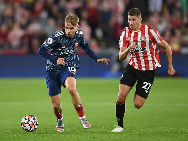 Brentford vs Arsenal: Emile Smith Rowe Clashes with Vitaly Janelt in Premier League Showdown