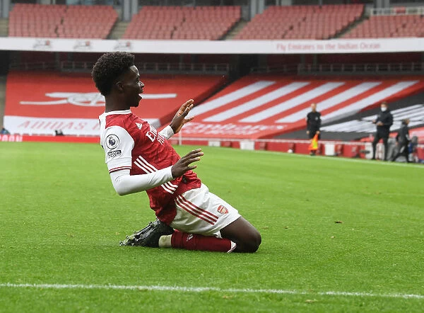 Bukayo Saka Scores First Goal in Empty Emirates: Arsenal's Historic Victory over Sheffield United in the 2020-21 Premier League