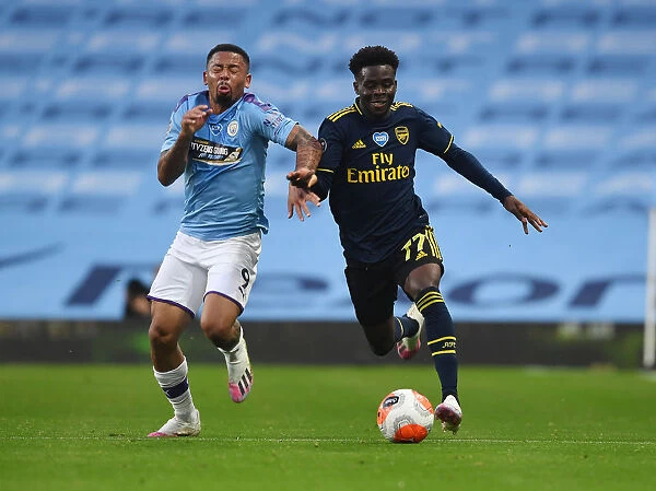 Bukayo Saka vs. Gabriel Jesus: Clash of Premier League Titans - Manchester City vs. Arsenal FC