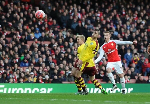 Calum Chambers Scores the First Goal: Arsenal Triumphs Over Burnley in FA Cup Fourth Round