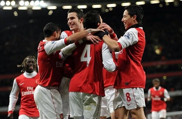 Celebrating Glory: Fabregas, Walcott, van Persie, and Nasri Rejoice in Arsenal's 3:1 Victory over Chelsea