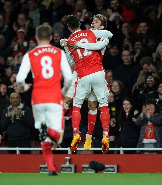 Celebrating the Goal: Monreal and Giroud's Exultant Moment at Arsenal vs Leicester City
