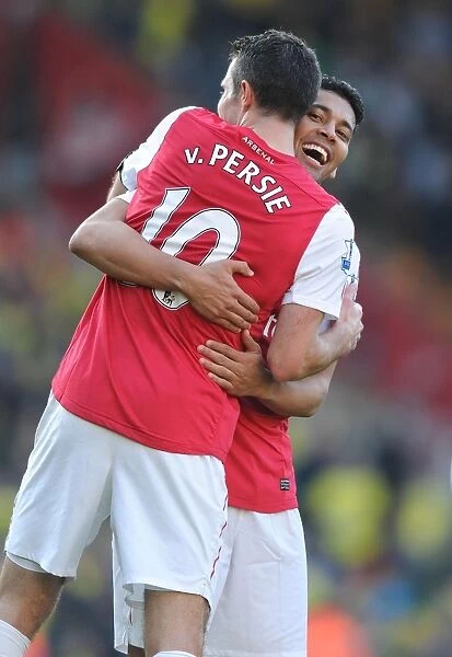 Celebration: Robin van Persie and Andre Santos, Arsenal