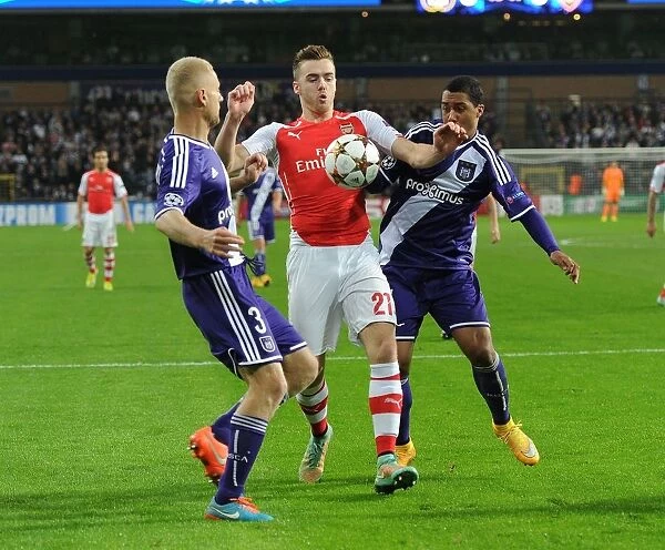 Chambers vs. Tielemans and Acheampong: Intense Clash in Anderlecht v Arsenal UEFA Champions League Match, 2014