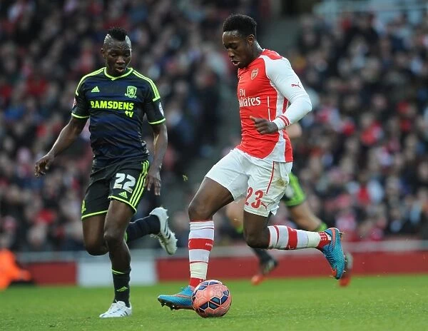 Charging Forward: Danny Welbeck Outsmarts Kenneth Omerou in FA Cup Battle (Arsenal vs. Middlesbrough)