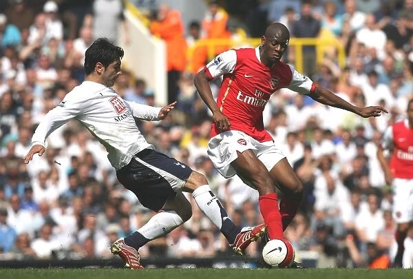 Clash of Rivals: Abu Diaby vs. Ricardo Rocha - The Intense Rivalry between Arsenal's Diaby and Tottenham's Rocha during the 2006-07 FA Premiership Match at White Hart Lane