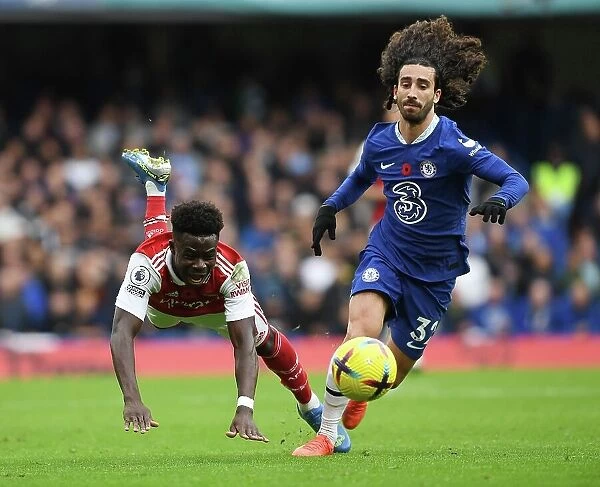 Clash at Stamford Bridge: Arsenal's Bukayo Saka Faces Off Against Chelsea's Marc Cucurella in the Premier League Showdown