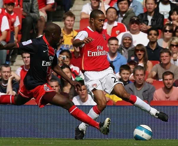 Clash of Titans: Arsenal's Gael Clichy vs. Paris Saint-Germain's Youssuf Mulumbu - Arsenal's 2:1 Victory in Emirates Cup, Day One
