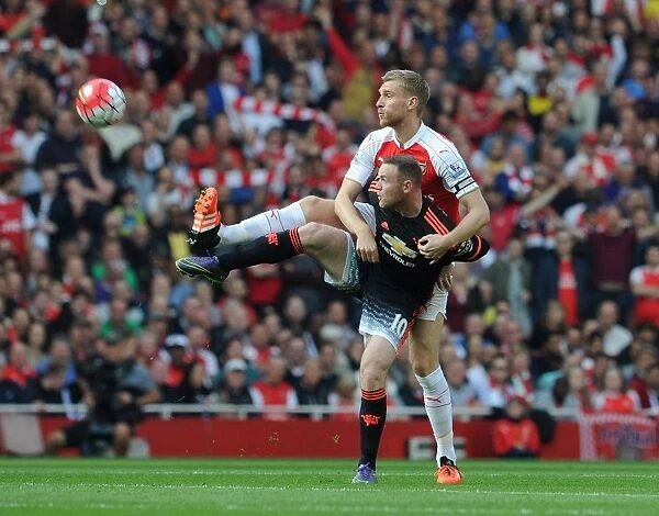 Clash of Titans: Per Mertesacker vs Wayne Rooney - Arsenal vs Manchester United