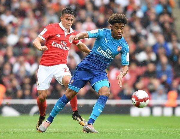 Clash of Wings: Reiss Nelson vs. Franco Cervi at the Emirates Cup