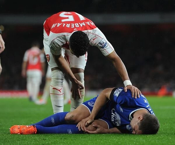 Compassion on the Field: Oxlade-Chamberlain Consoles Injured Jagielka (Arsenal vs. Everton, 2015 / 16)