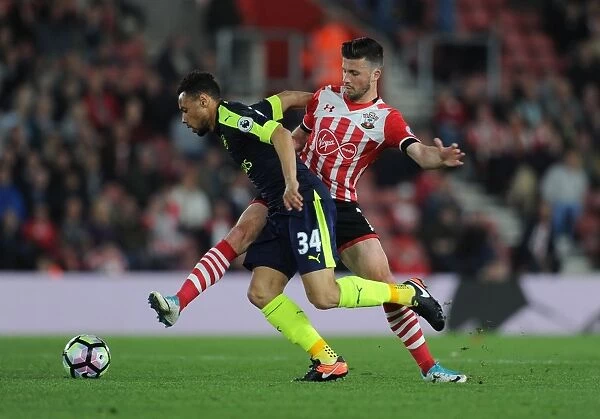 Coquelin vs. Long: Intense Battle in Southampton vs. Arsenal Premier League Clash