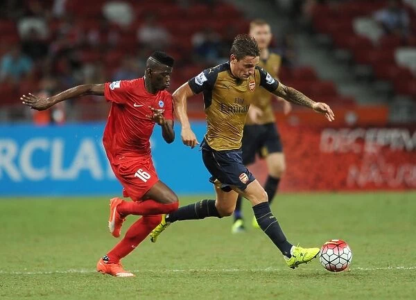 Debuchy vs. Camara: Arsenal Star Clashes with Singapore's Best in Barclays Asia Trophy