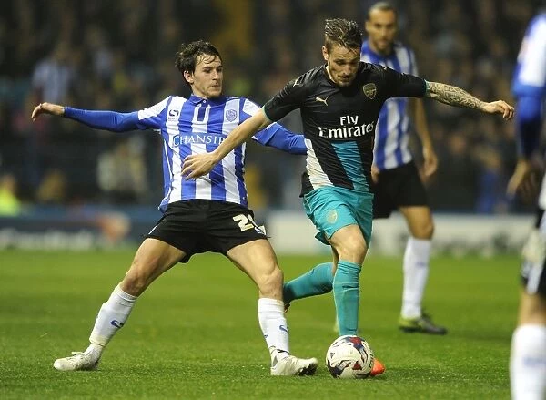 Debuchy vs. Lee: Arsenal's Defender Clashes With Sheffield Wednesday's Midfielder in Capital One Cup Showdown