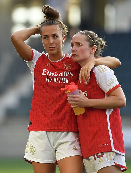 Disappointment and Determination: Arsenal Women's Heartbreaking Penalty Shootout Loss to Paris FC - Lia Walti and Kim Little's Reaction