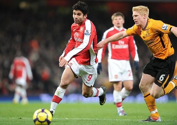 Eduardo (Arsenal) Paul McShane (Hull). Arsenal 3: 0 Hull City, Barclays Premier league