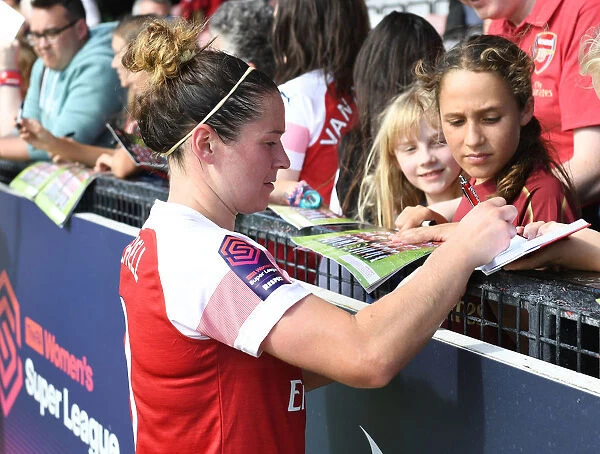 Emma Mitchell Signs for Fans after Arsenal Women's Continental Cup Match vs West Ham United Women