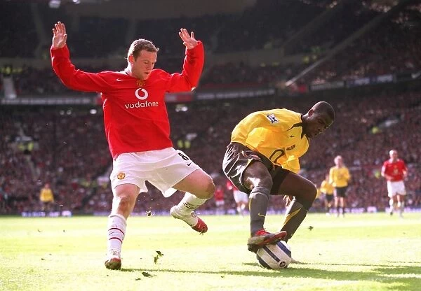 Emmanuel Eboue (Arsenal) Wayne Rooney (Man Utd). Arsenal 0: 2 Manchester United