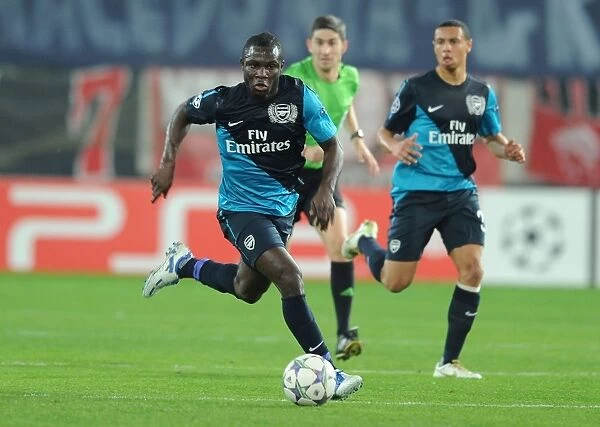 Emmanuel Frimpong: In Action for Arsenal in the 2011-12 UEFA Champions League Match against Olympiacos