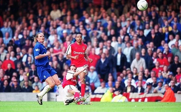 Fredrik Ljungberg Scores the Second Goal: Arsenal's 2-0 Lead over Chelsea in the FA Cup Final at Millennium Stadium, Cardiff, Wales (April 5, 2002)