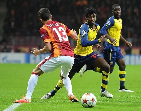 Gedion Zelalem Outmaneuvers Alex Telles: Galatasaray vs. Arsenal, UEFA Champions League, Istanbul, 2014