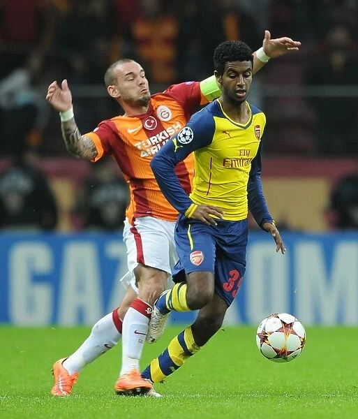 Gedion Zelalem Outmaneuvers Wesley Sneijder: Galatasaray vs. Arsenal, UEFA Champions League, Istanbul, 2014