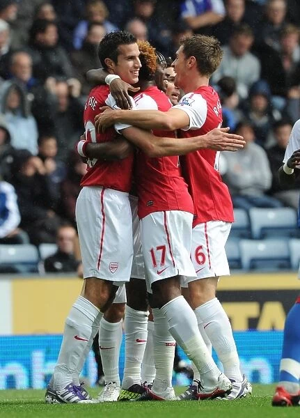 Gervinho scores celebrates scoring Arsenals 1st goal with Robin van Persie