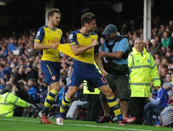 Giroud and Ramsey Celebrate Arsenal's Winning Goals Against Everton (2014 / 15)