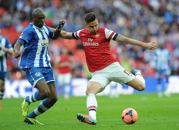 Giroud vs. Boyce: Intense Moment at the FA Cup Semi-Final between Arsenal and Wigan