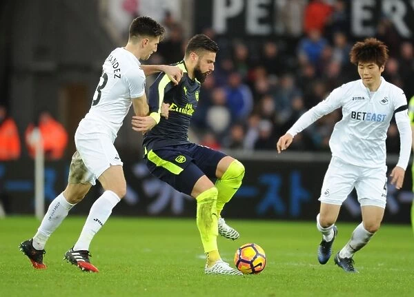Giroud vs Fernandez: A Fierce Rivalry Erupts in the Arsenal vs Swansea City Premier League Clash, 2016-17