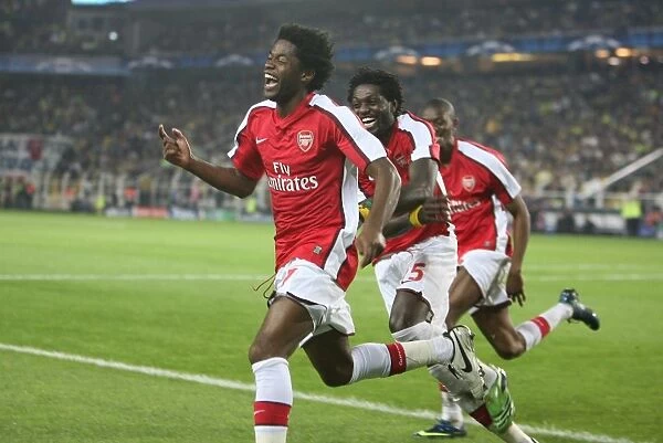 Four Goal Blitz: Song, Adebayor, and Diaby Celebrate Arsenal's Dominant 5-2 Win Over Fenerbahce in the UEFA Champions League