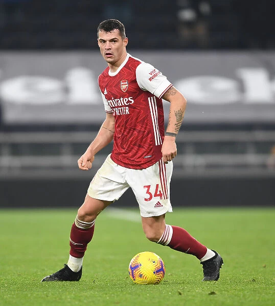 Granit Xhaka of Arsenal in Action at Tottenham Hotspur Stadium during the 2020-21 Premier League Match