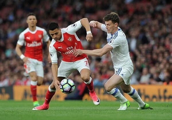 Intense Face-Off: Alexis Sanchez vs. Billy Jones in Premier League Showdown