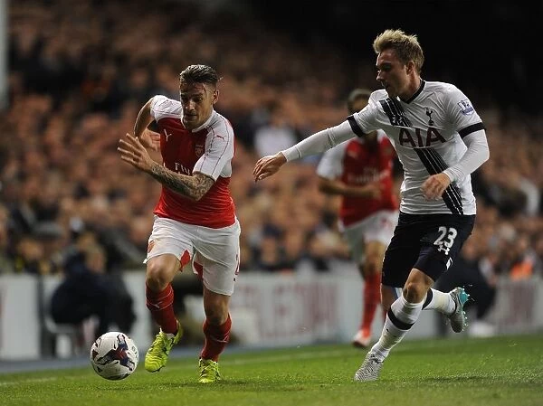 Intense Rivalry: Debuchy vs. Eriksen in the Battle of the Capital One Cup: Tottenham vs. Arsenal