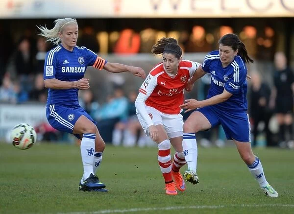Intense Rivalry: Vicky Losada Stands Ground Against Katie Chapman and Niamh Fahey of Chelsea Ladies in Arsenal vs. Chelsea WSL Clash