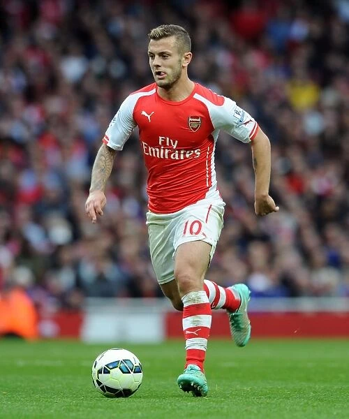 Jack Wilshere: Arsenal's Midfield Maestro in Action against Hull City, Premier League 2014-15