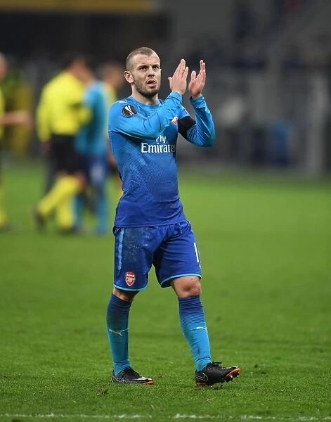 Jack Wilshere Celebrates with Arsenal Fans after AC Milan Showdown in Europa League