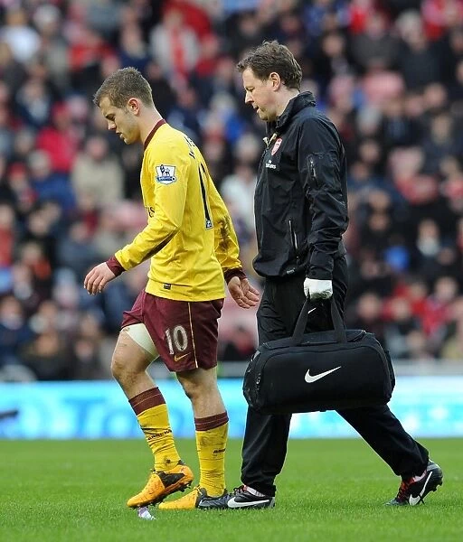 Jack Wilshere Leaves Field with Arsenal Physio: Sunderland vs Arsenal, Premier League 2012-13
