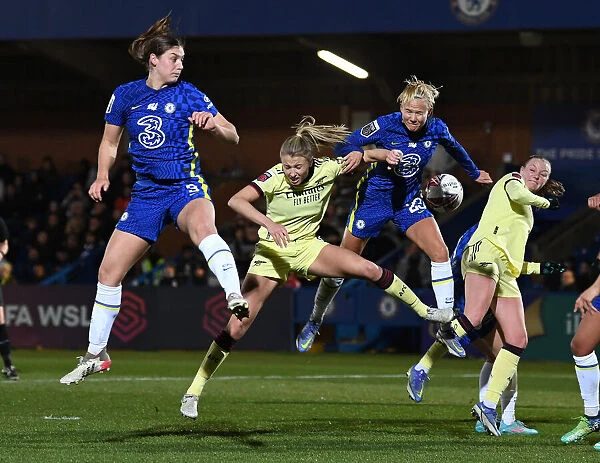Leap of Determination: Williamson Fights for the Ball in Chelsea vs. Arsenal FA WSL Clash