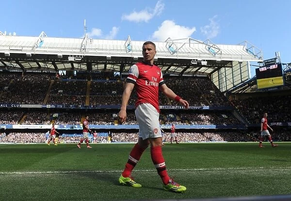 Lukas Podolski Faces Off Against Chelsea: Premier League Showdown (2013-14)