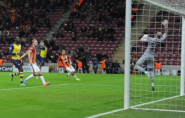 Lukas Podolski Scores Past Sinan Bolat: Arsenal's Victory Over Galatasaray in UEFA Champions League