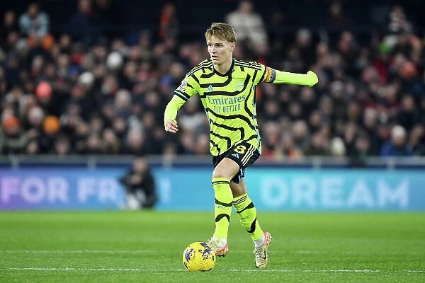 Martin Odegaard Charges Forward: Luton Town vs. Arsenal FC, Premier League 2023-24
