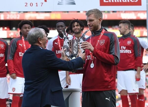 Per Mertesacker Lifts Emirates Cup Trophy: Arsenal v Sevilla, 2017