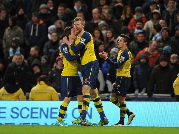 Per Mertesacker, Tomas Rosicky, and Alexis Sanchez Celebrate Arsenal's Goals Against Manchester City (2014-15)
