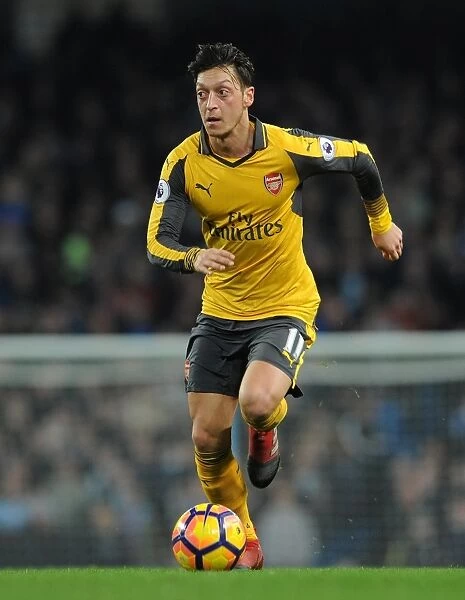 Mesut Ozil (Arsenal). Manchester City 2: 1 Arsenal. Premier League. Eithad Stadium