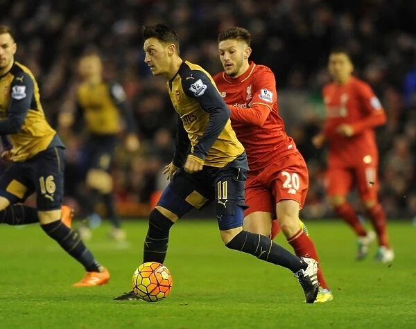 Mesut Ozil Outmaneuvers Adam Lallana: Premier League Showdown between Liverpool and Arsenal (2015-16)